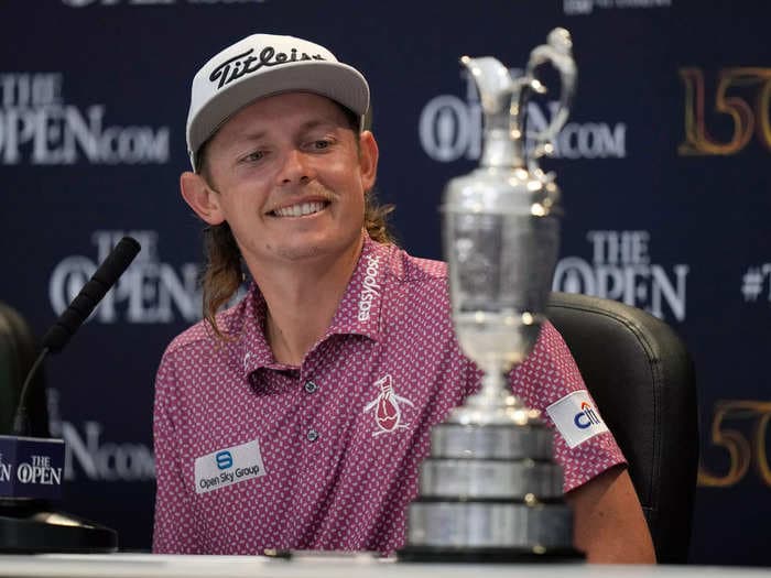 Cam Smith celebrates Open Championship by figuring out exactly how much beer fits in the Claret Jug