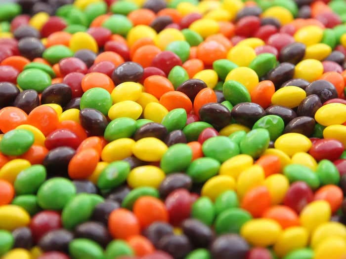 A lawsuit claims Skittles is 'unfit for human consumption' because it contains a chemical that's banned in Europe for potential cancer risk
