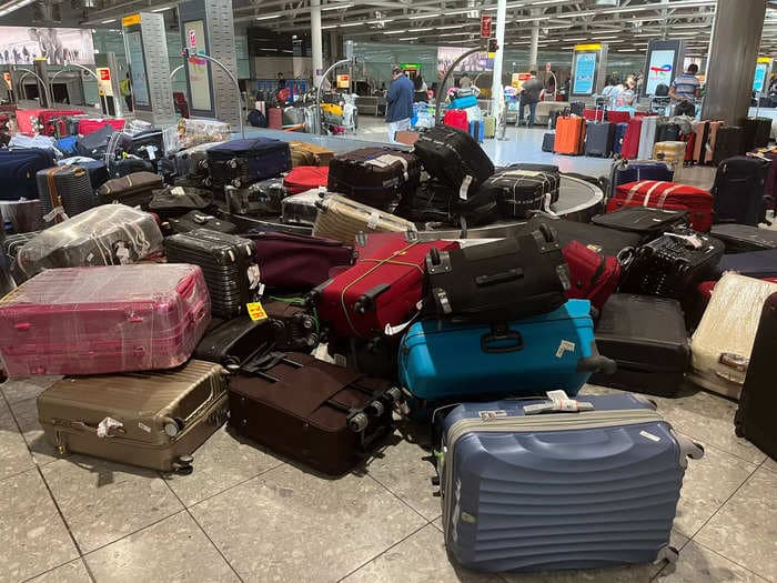 Piles of golf bags were left behind in Scotland's Edinburgh Airport even after players and fans flew out from The Open: reports