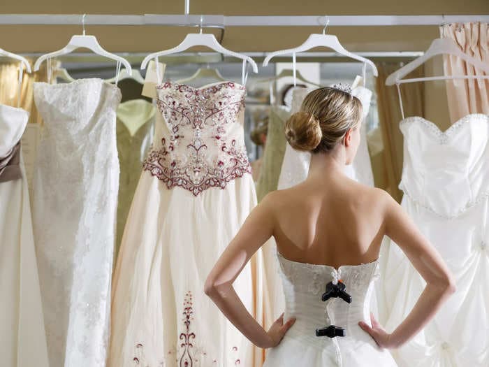 A bridal shop owner shares the biggest signs that a bride is going to be difficult to dress