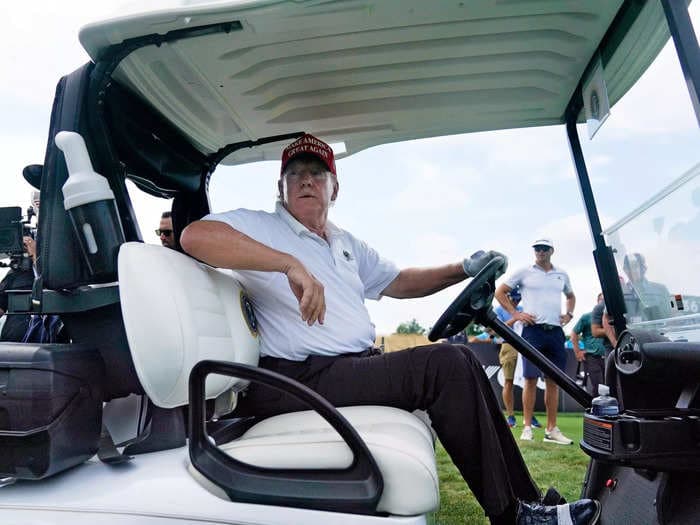 PHOTOS: Golfing with Donald Trump requires a lot of golf carts, as the LIV Golf pro-am demonstrated