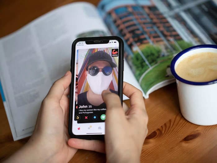 Tinder revives 'Desk Mode' feature for singles returning to the office, offering them a button to quickly hide swiping