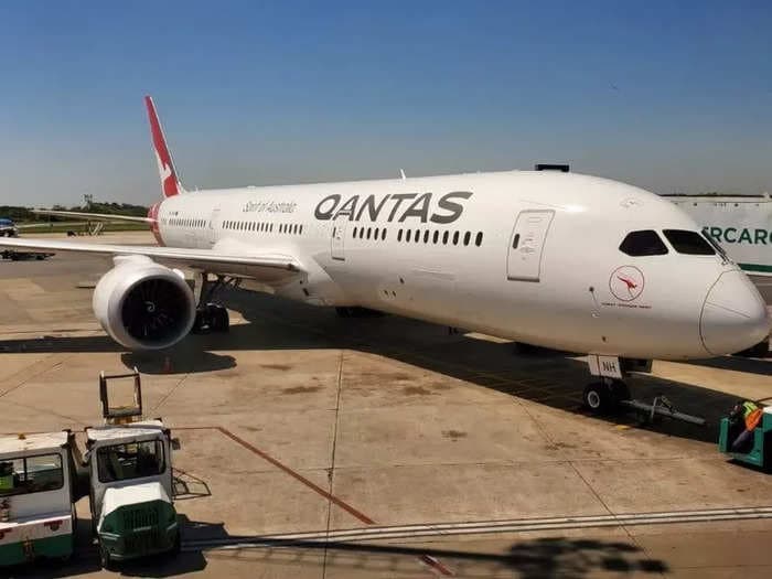 Qantas passengers were delayed on an airport runway for almost the length of their flight due to a technical glitch