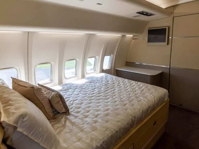 See inside a VIP Boeing 757 private jet that has a full bedroom and dining room