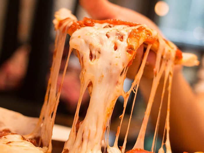 Cheese prices are exploding, and that's bad news for pizza chains