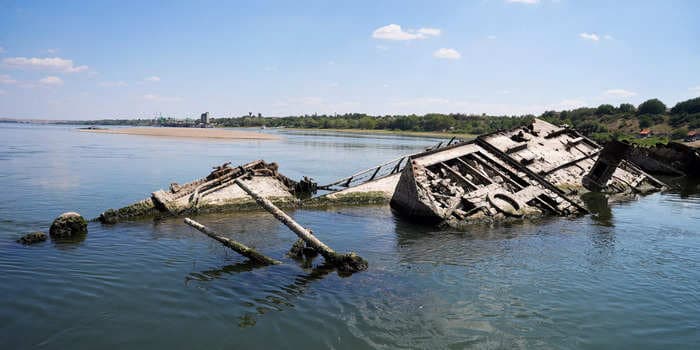 Photos of a Nazi fleet of ships sunk in World War II that have resurfaced in Europe's drought