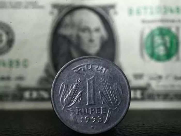 Rupee falls 14 paise to 79.66 against US dollar in early trade