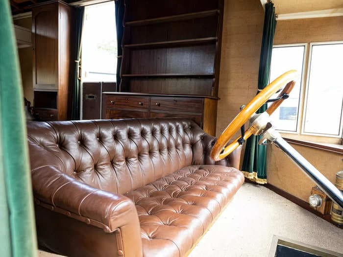 A 1914 caravan believed to be the world's oldest motorhome is up for auction. Take a look inside.