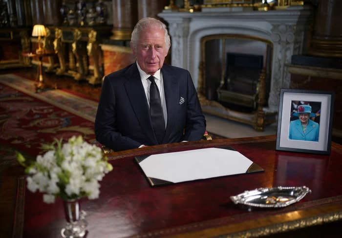 King Charles III delivered his 1st speech as monarch with a photo of his late mother by his side