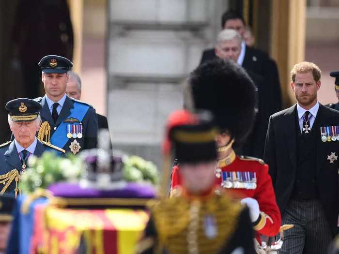 Striking photos show Prince Harry and Prince William with King Charles and other royals as they walk behind the Queen's coffin in London