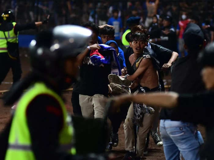 129 people are dead after police fired tear gas to break up fights following an Indonesian soccer match