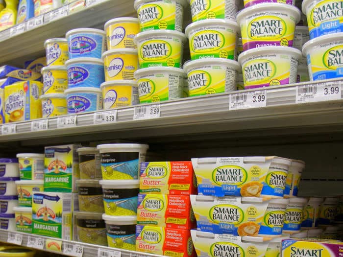 A margarine brand is going back to its old recipe after customers revolted, calling the new formula with less vegetable oil 'disgusting'