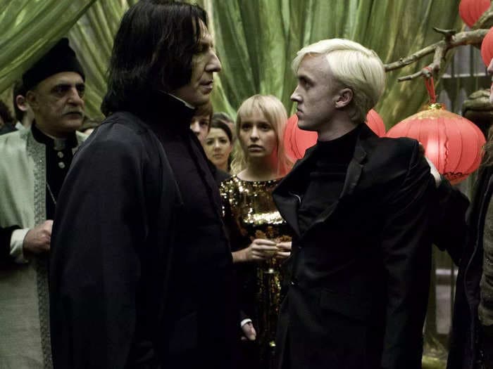 'Harry Potter' star Tom Felton remembers being scolded by Alan Rickman on set after stepping on his cloak: 'I'll never forget those words'