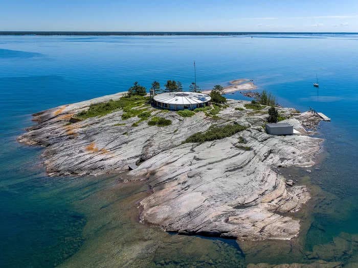 An architect built a perfectly circular summer home on an island for his family in 1971. Now, it's on the market for $1.9 million &mdash; check it out.