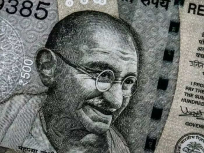 Rupee touches 83.01 against dollar amid key rate hike expectations by US Fed