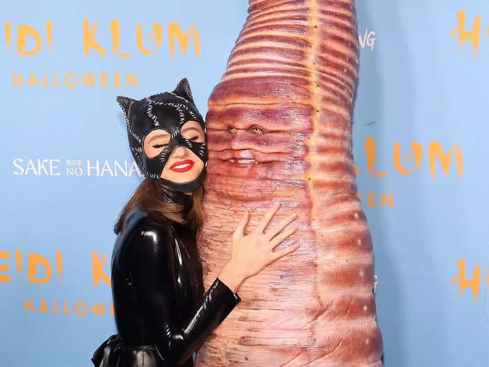 Heidi Klum and her daughter Leni embraced on the red carpet while dressed as Catwoman and a giant worm