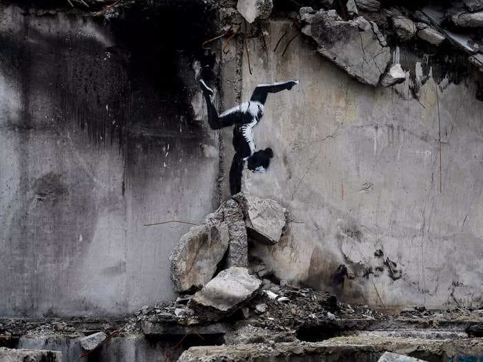Banksy, the elusive street artist, created a new mural in Ukraine depicting a gymnast on a building damaged during conflict with Russia