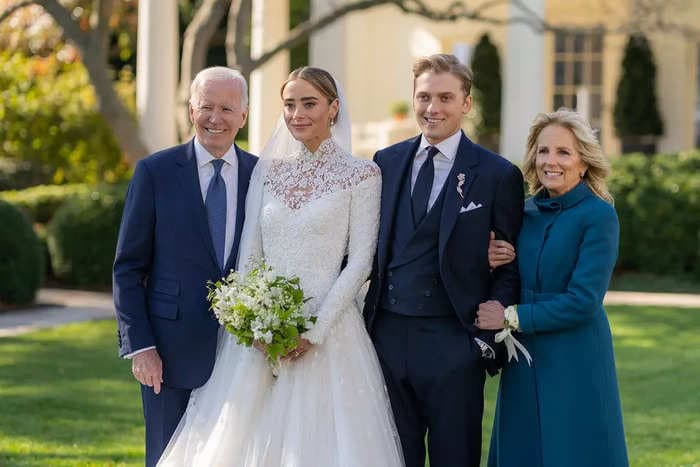 Naomi Biden wore a long-sleeved gown with a lace neckline for her White House wedding to Peter Neal