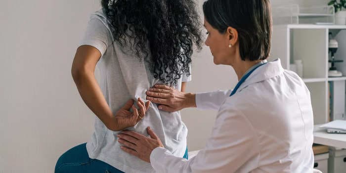 Signs that your chronic back pain is actually an issue with your kidneys, according to doctors