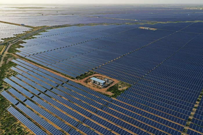 India is harnessing renewable energy through the world's biggest solar farm. Here's how it happened.