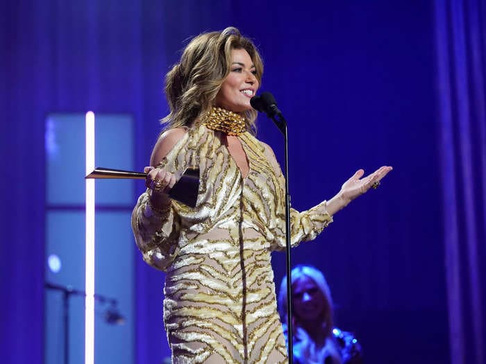 Shania Twain said she would 'flatten' her boobs growing up to protect herself from sexual abuse in her childhood home