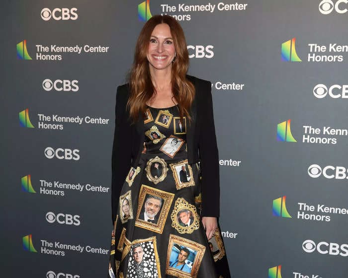 Julia Roberts showed up to an event honoring George Clooney in a dress that had the actor's face all over it