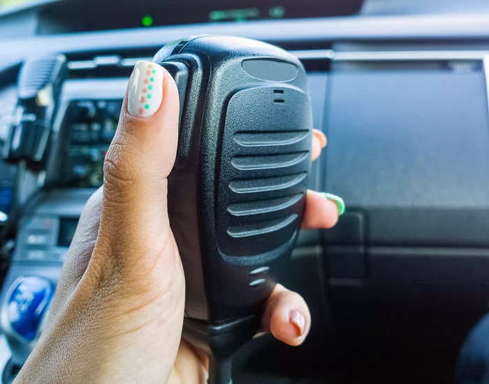 A sheriff's deputy is under investigation after accidentally broadcasting on her police radio what appeared to be an intimate encounter with a man, say reports