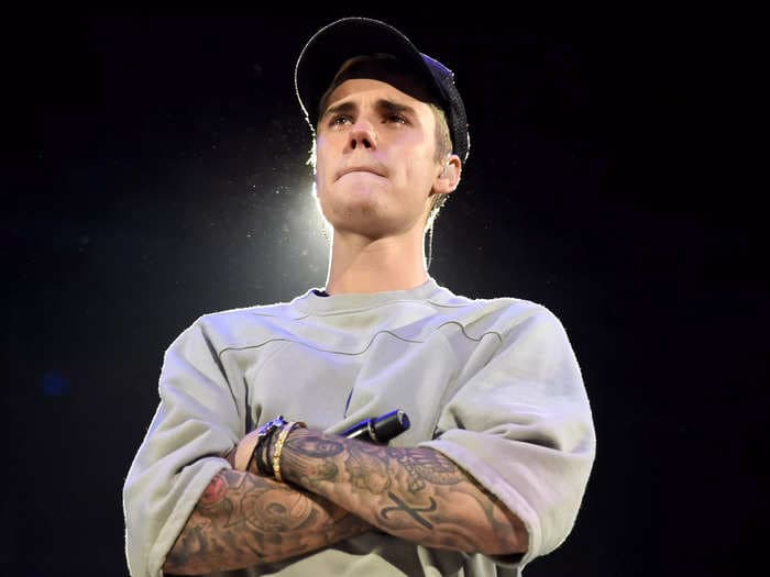 Justin Bieber vs H&M: The Swedish fast-fashion giant says it has the rights to sell merch with Bieber's imagery, such as hoodies and t-shirts featuring the lyrics of the song 'Ghost'