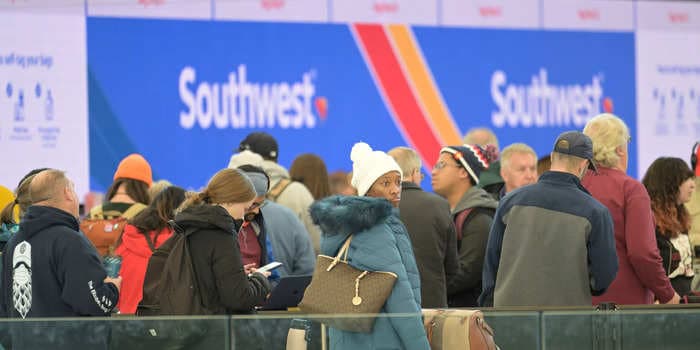 Southwest Airlines falls 5% after it cancels thousands of flights over the holiday weekend, with more cancellations spilling over into the rest of this week