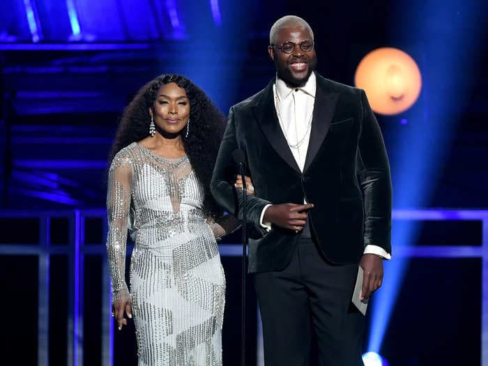 Winston Duke joked that standing ovations for Angela Bassett on the set of 'Wakanda Forever' 'got a little old after three times'