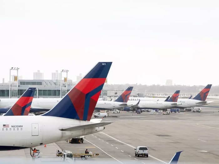 Federal agencies are investigating the near-collision of American and Delta jets in New York