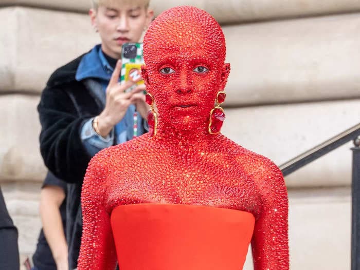 Doja Cat wore 30,000 crimson Swarovski crystals that took nearly 5 hours to apply at Paris Fashion Week