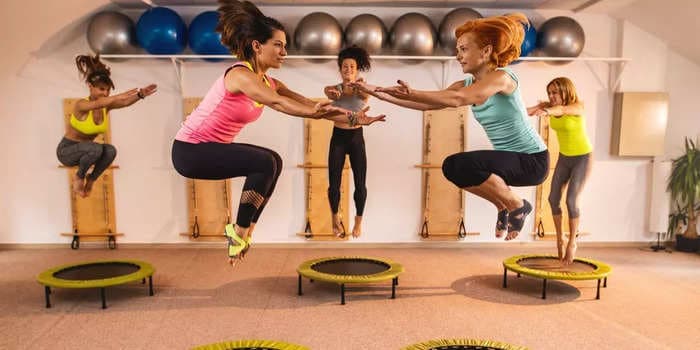 Trampolines aren't just for kids &mdash; these 8 workouts can help build strength, improve overall balance, and even lower blood pressure