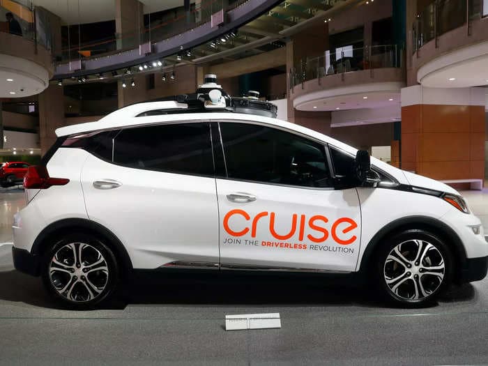 Firefighters smashed the window of a driverless Cruise taxi to stop it running over their hoses