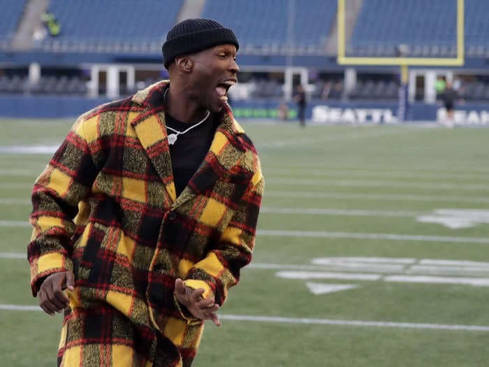 Former NFL wide receiver Chad Ochocinco says he would fly coach and buy fake jewelry to save money while playing in the league