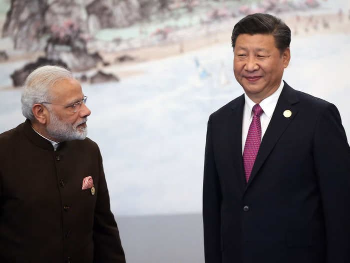 Adani's crisis is casting a cloud over India &mdash; and it could benefit China, which is just reopening after 3 years of COVID isolation