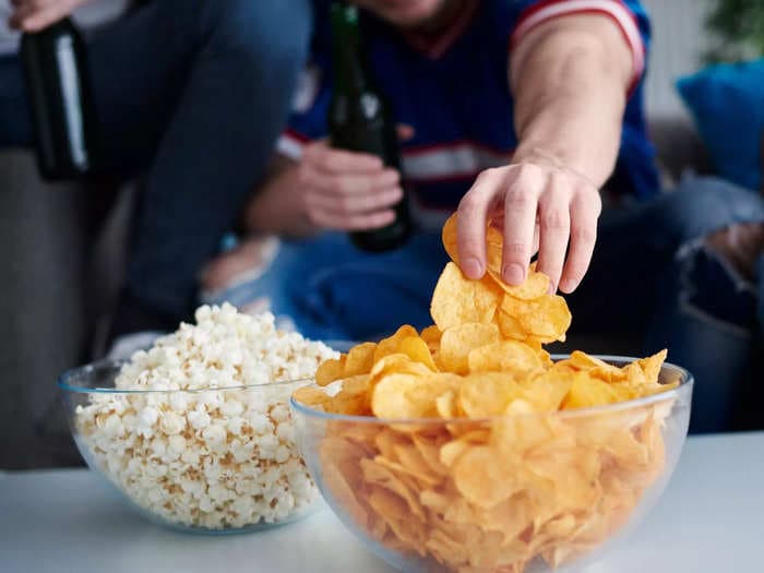 Americans are comfort eating potato chips, popcorn, and pretzels as economic anxiety rises and recession looms