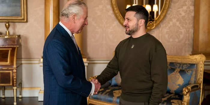 Zelenskyy wore his signature olive-green sweater to meet King Charles during his surprise visit to the UK. Here's why he is rarely seen without it