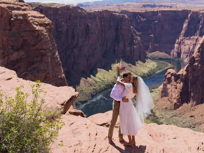 A bride who spent $100 on her wedding wore a $20 dress and went barefoot to her outdoor ceremony