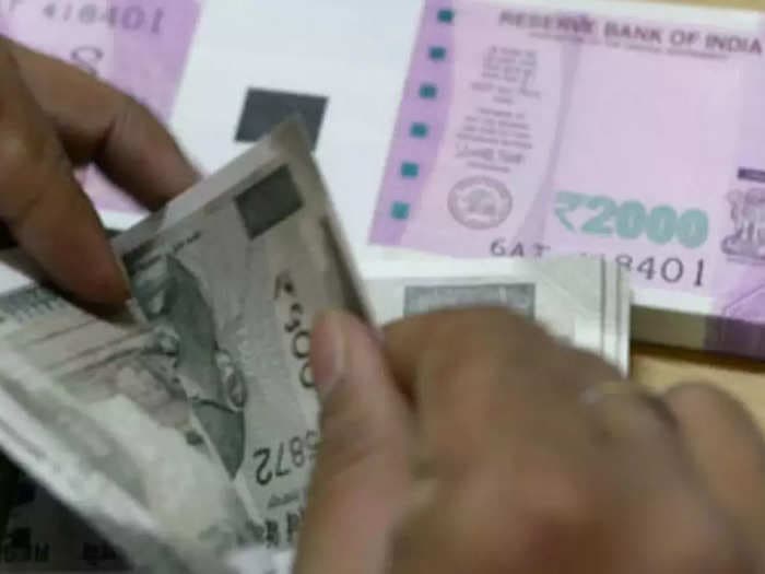 Rupee gains 10 paise to close at 82.72 against US dollar