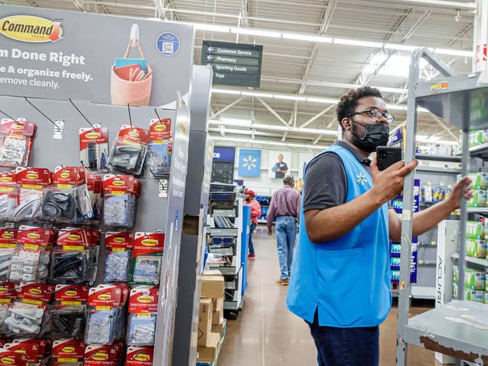 Walmart and Home Depot are spending heaps of cash on pay raises because they can't afford to lose workers