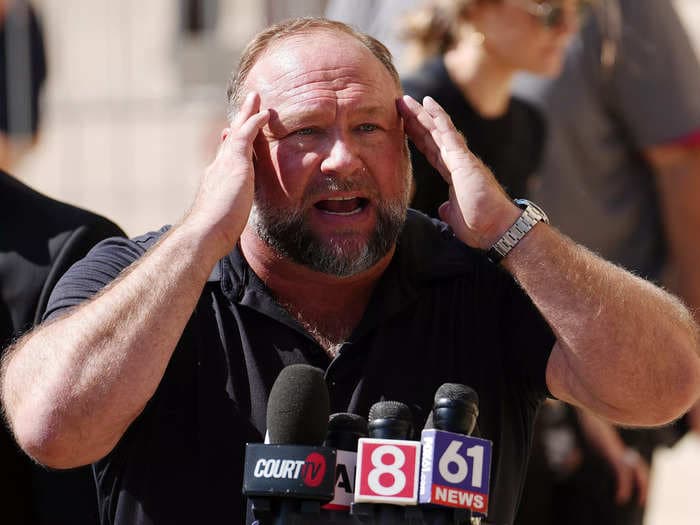 Alex Jones claims authorities want to take his expensive cat because he's bankrupt. He's leaving out the fact he gave his wife and parents $1.3 million last year.