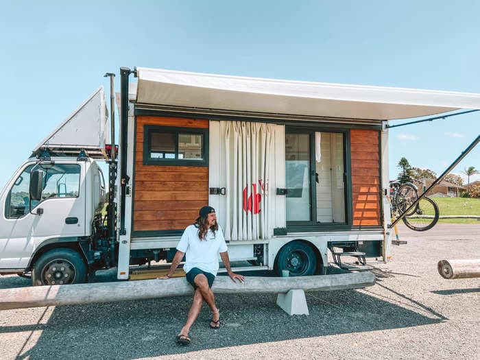 A young couple turned a Coca-Cola truck into a tiny home on wheels and now live rent-free