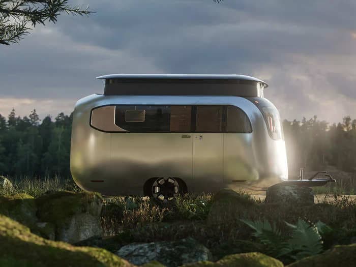 Airstream and Porsche have unveiled a sleek and modern concept RV that can fit inside a garage &mdash; see inside