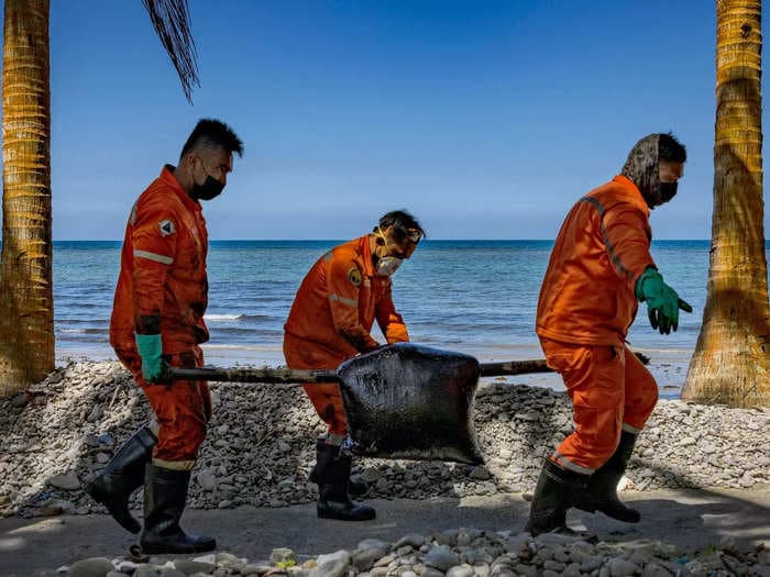 An oil spill off the Philippine coast has coated some of the world's most beautiful beaches in sludge: 'Our white sand is now black'