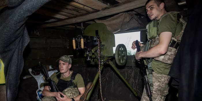 Ukraine's troops fight off 'massive' Russian attacks in Bakhmut with World War I-era machine guns and sniper traps