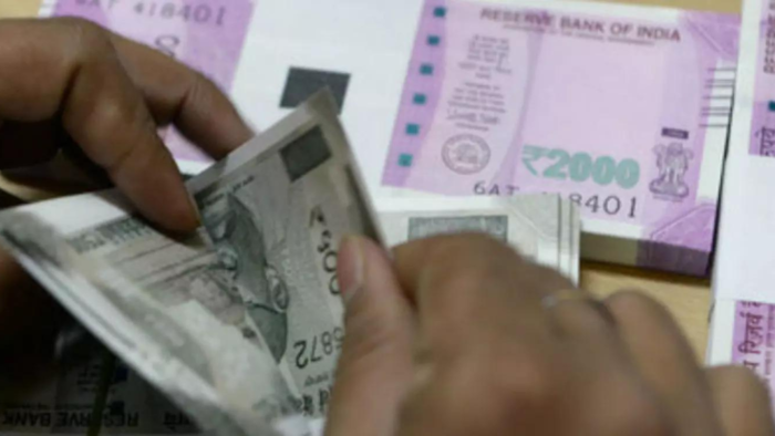 Weighed down by a strong dollar, Rupee falls 24 paise to close at 82.44/USD