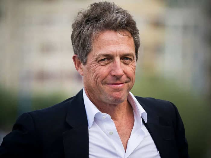 Hugh Grant says movie sets 'are so weird now,' as actors no longer get drunk and fall 'in love with each other' because of mobile phones: 'It's so sad'