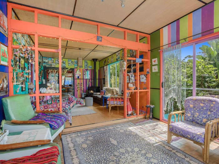 A retired Australian couple spent 17 years decking out every inch of their home with crafts and color. Now, they're listing the 3-bedroom house for $900,000 &mdash; see inside.