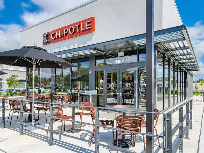 Take a look inside Chipotle's new-look all-electric restaurants, with solar panels, EV charging, and seats made from cactus leather